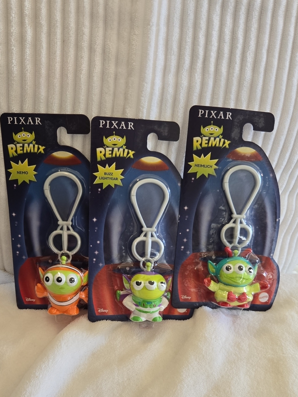 NWT-Pixar Remix Alien Keychain Trio - Heimlich,buzz,nemo